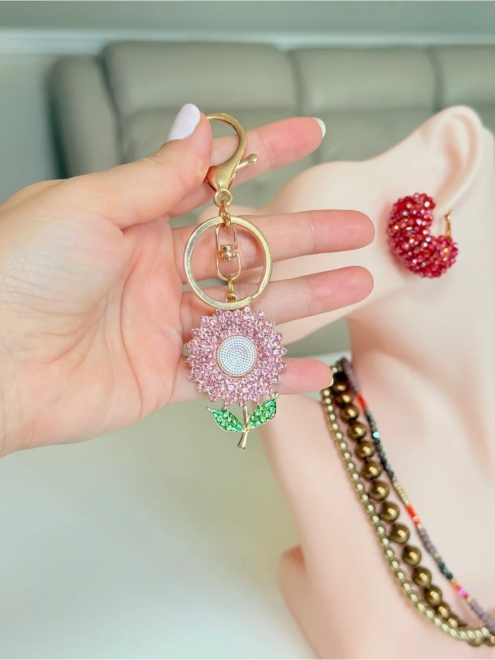 Gold-Tone Pink Crystal Sunflower Keychain with Green Leaves